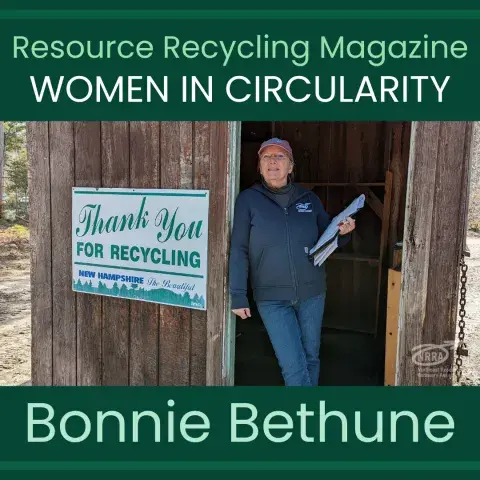 Picture of NRRA's Bonnie Bethune leaning on a wall near a "Thank You for Recycling" sign.