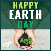 Happy Earth Day 2023 with image of hands holding a green plant