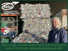 Denise Cumings, crew chief, stands in front of a bale of recycling at the Hooksett Transfer Station